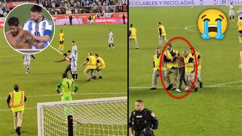 messi bulge|Crazed fan tries to get Lionel Messi to sign shirtless body on field.